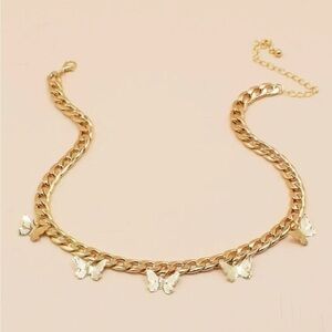 Gold butterfly charm necklace
